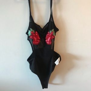 Black nylon body suit